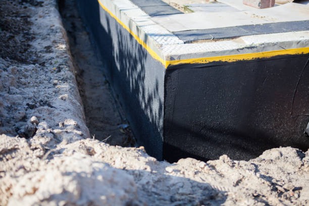 Professional Waterproofing technician working in Alpine, AL